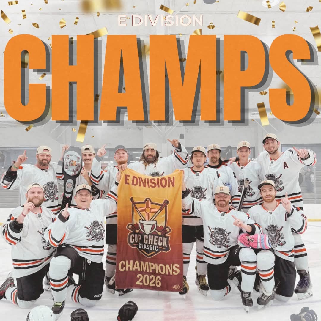 E Division champions holding the 2026 championship banner